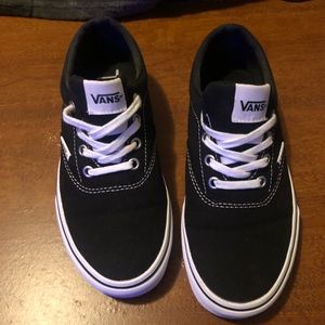 Black and white vans. Wore one time. Size 6 w